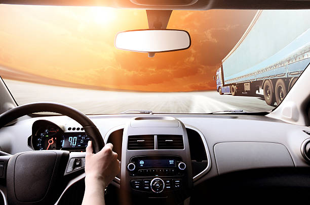 istock Driver's hands on steering wheel inside of a car 478956130