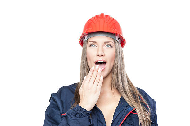 istock Woman with safety helmet looking surprised 478961087
