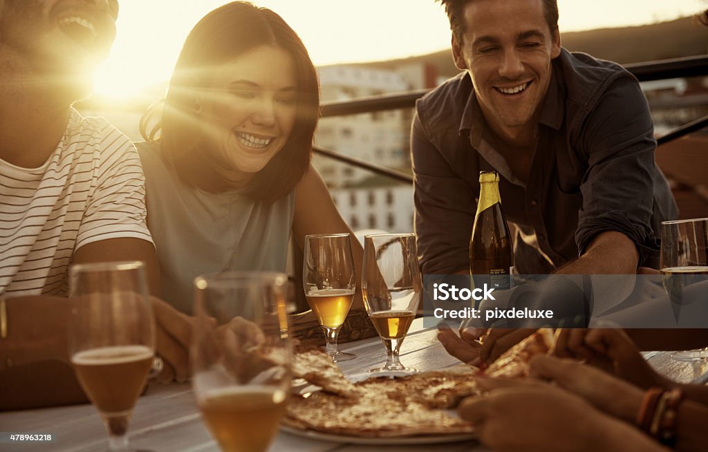 Tucking into some great food Shot of friends enjoying food and drinks together outsidehttp://195.154.178.81/DATA/i_collage/pu/shoots/799627.jpg 2015 Stock Photo