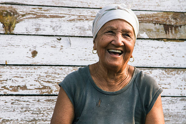 Happy laughing Cuban lady Happy Cuban lady portrait cuban ethnicity stock pictures, royalty-free photos & images