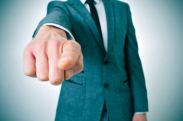 istock man in suit pointing the finger 478965581