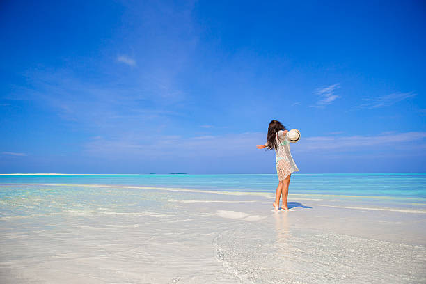 istock Young woman enjoy tropical beach vacation 478967528