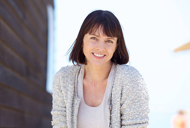 istock Natural fresh older woman smiling 478970612