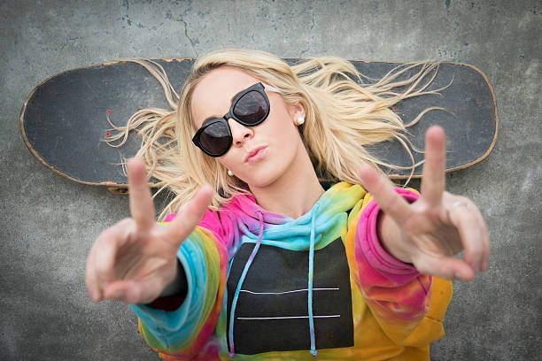 istock Skater Girl Peace Sign 478972222