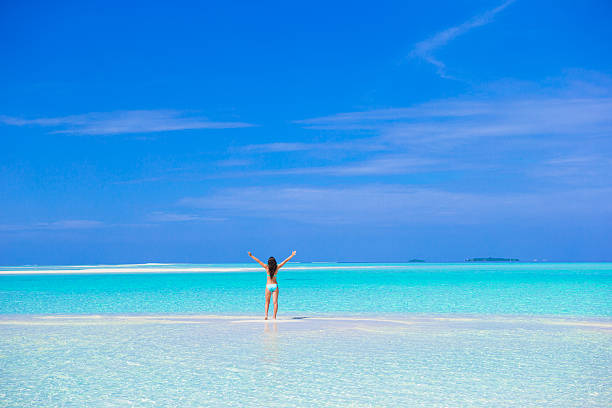 istock Young woman enjoy tropical beach vacation 478974974