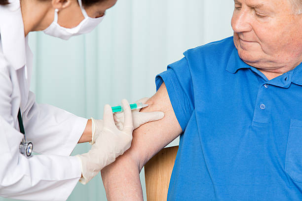 istock Hospital - Senior man getting an injection 478975575