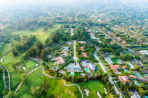 Photo of Bel Air Los Angeles neigborhood mansions and golf course, aerial