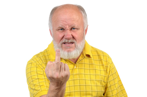 senior bald man shows middle finger