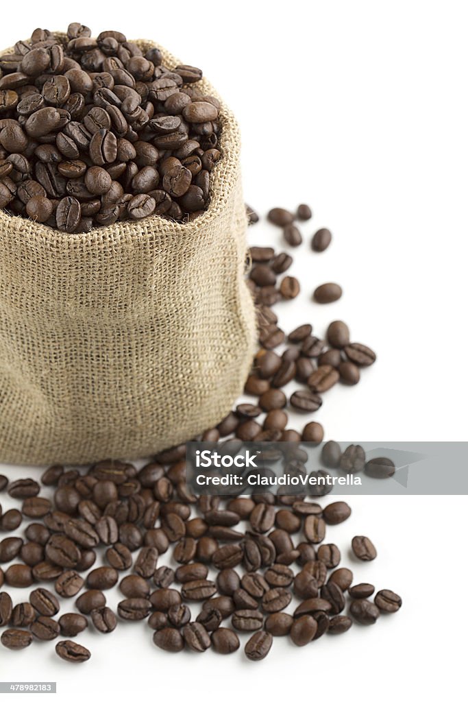 coffee beans in a burlap bag jute bag full of coffee beans on white background Backgrounds Stock Photo