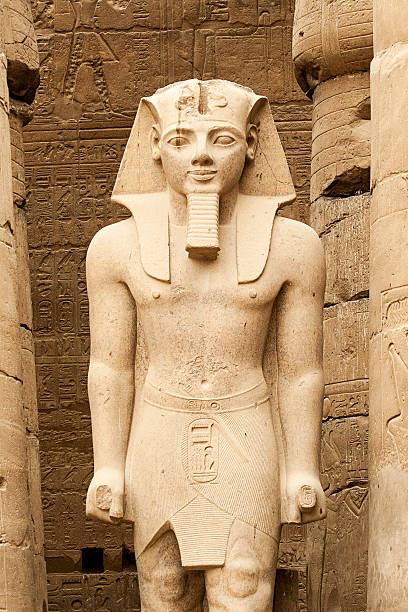 Rameses II At Luxor Temple, Egypt A Statue of Rameses II At Luxor Temple, Egypt luxor thebes photos stock pictures, royalty-free photos & images