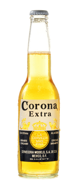 Poznan, Poland - February 26, 2014: Corona Extra, one of the top-selling beers worldwide is a pale lager produced by Cerveceria Modelo in Mexico
