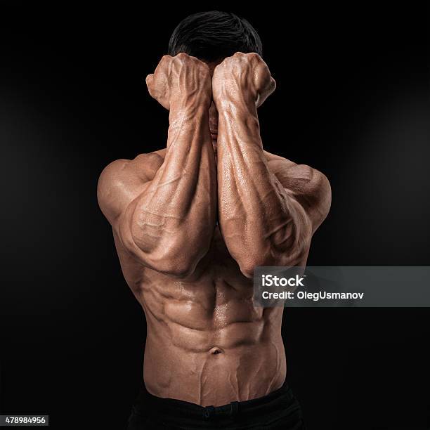 Power Hands In Front Of Face Stock Photo - Download Image Now - 2015, Activity, Adult