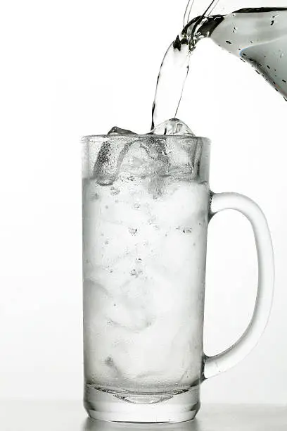 drinking water poured into a mug