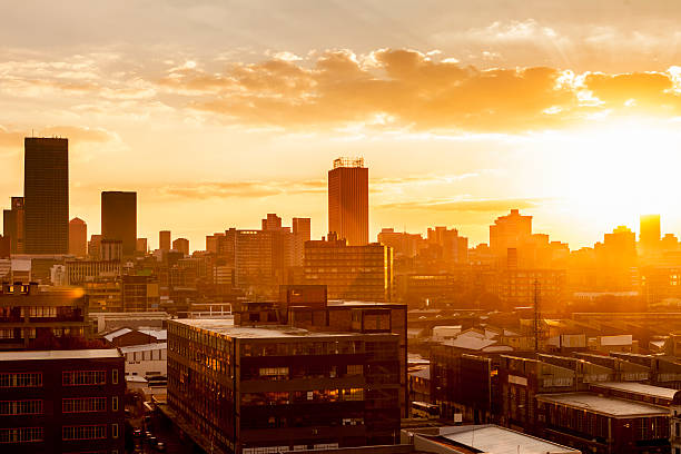 Johannesburg City at sunset Johannesburg city with the sun setting in the background johannesburg photos stock pictures, royalty-free photos & images