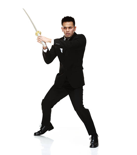 istock Businessman in action with sword 478993705