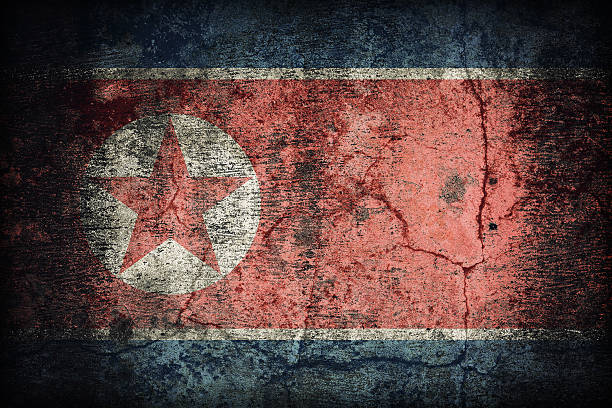 istock North Korea flag pattern on dirty old concrete wall texture 478995974