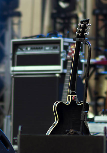 istock Guitar on stage waiting for musician 478999310