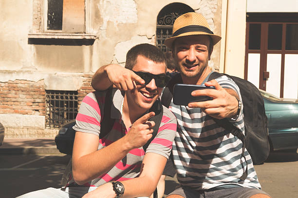 istock Couple of guys doing a selfie. 478999342