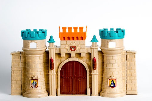 Quebec, Canada - February 5, 2014: Facade of a toy Castle on a white background