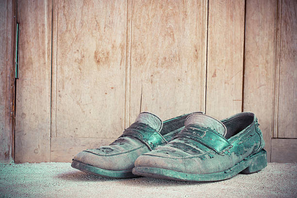 istock Dirty old leather shoes 479002616