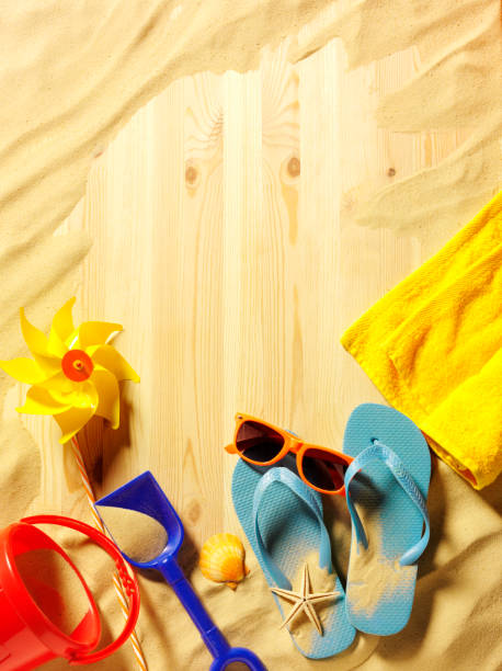 istock Flip Flops with a Bucket and Spade on the Beach 479011891