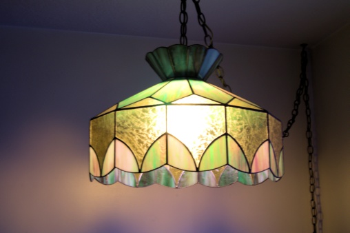 Stained glass lamp hanging from ceiling