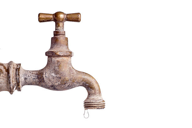 istock Old and used Vintage faucet with water drop 479019486