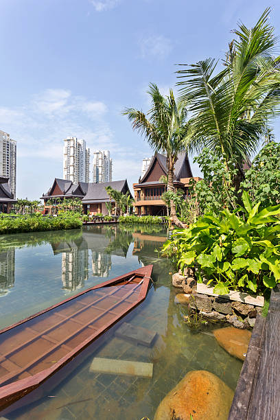 istock boat stop in water with resort building exterior 479020063