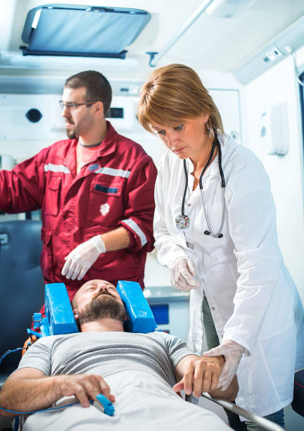 istock Medics caring for patient in ambulance 479023194