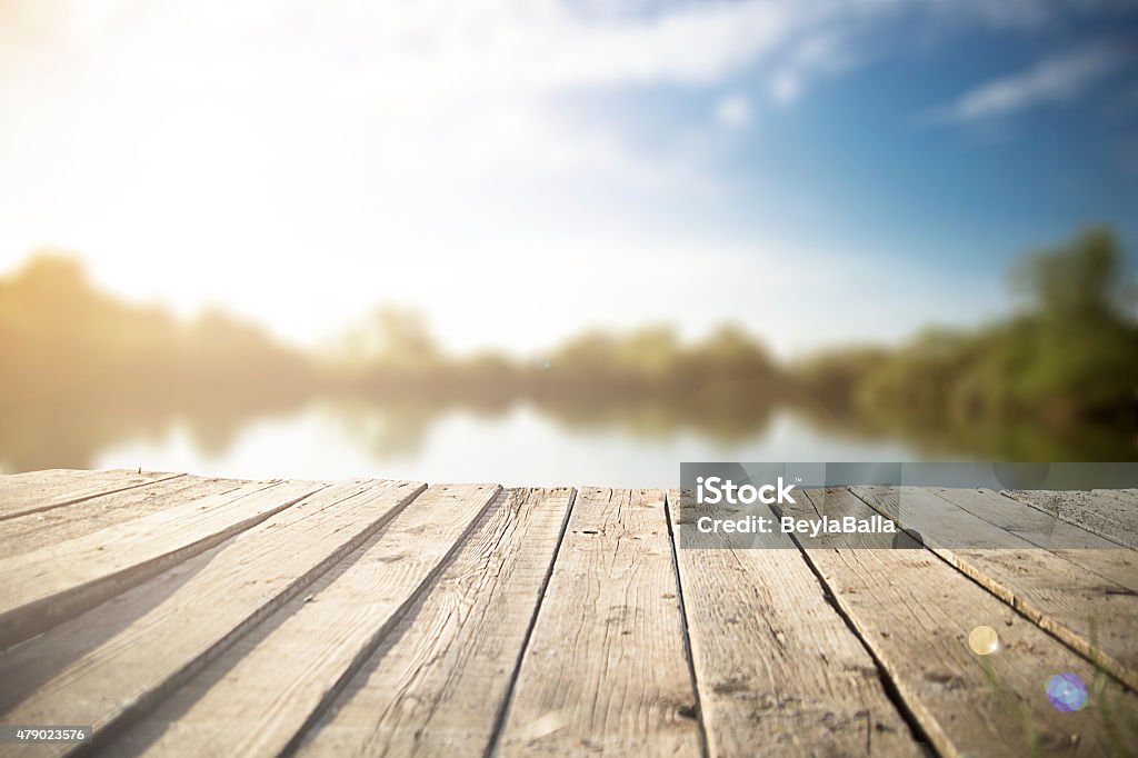 pier old wooden pier on the  lake. Lake Stock Photo