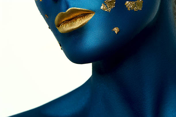 istock Beauty Model with blue Skin and gold Lips. Halloween Makeup 479026578