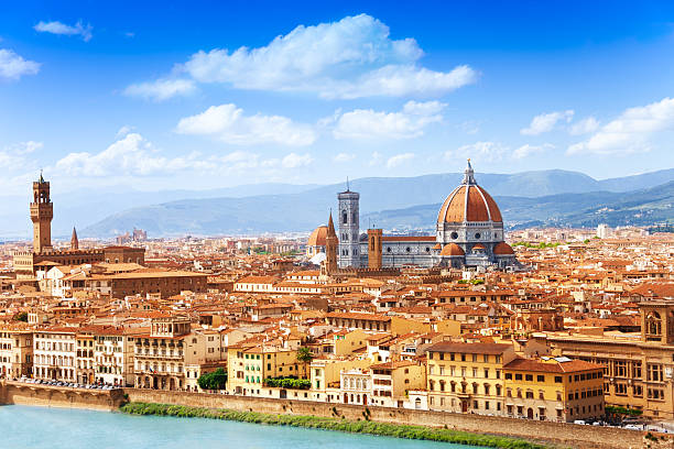 Cityscape of Florence Cityscape panorama of Arno river, towers and cathedrals of Florence bell tower tower photos stock pictures, royalty-free photos & images