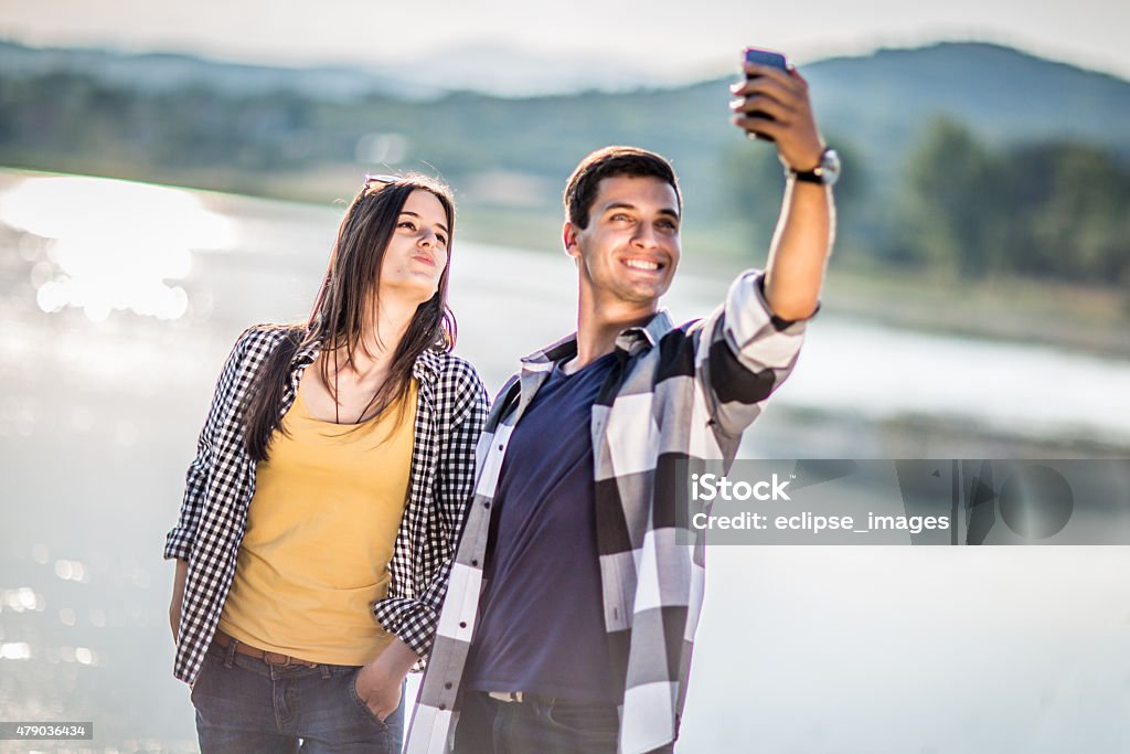 Young couple taking selfie 2015 Stock Photo