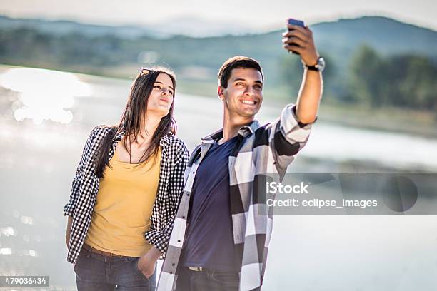 Young Couple Taking Selfie Stock Photo - Download Image Now - 2015, Adult, Adults Only