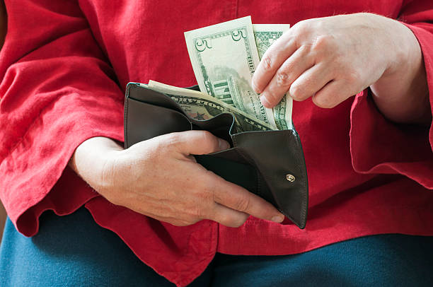 istock Women looks in her wallet 479036718