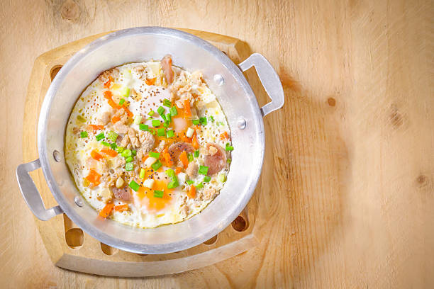 istock fried eggs pan with minced pork, onion , carrot 479037136