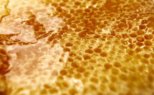 honey comb background.textured effects, gold colors.