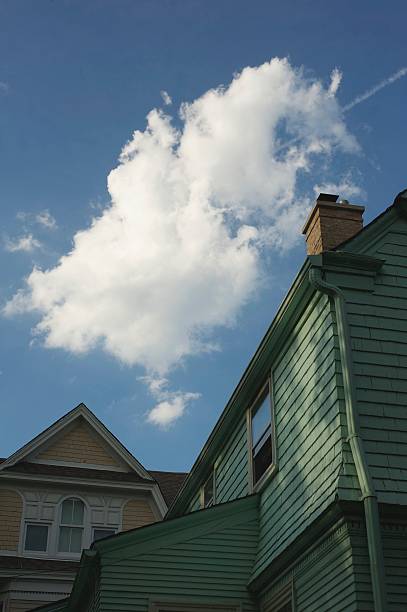 Cloud Above Houses stock photo