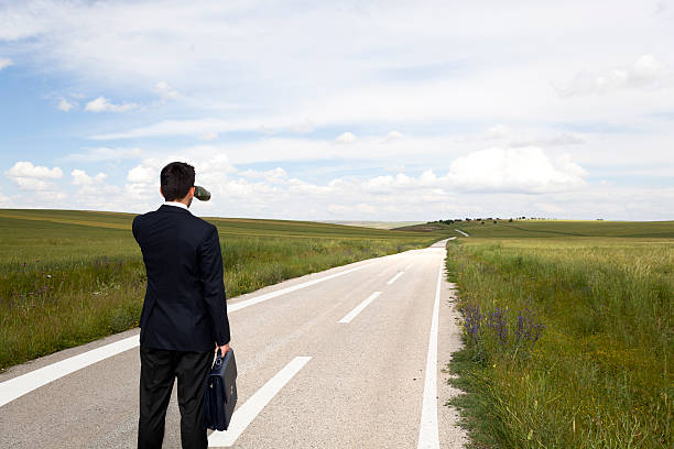 Businessman with binocular on travel