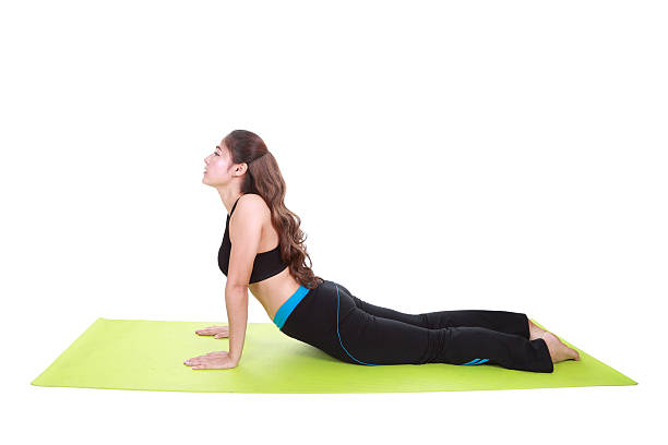 istock Young woman doing yoga exercise with yoga mat 479043080