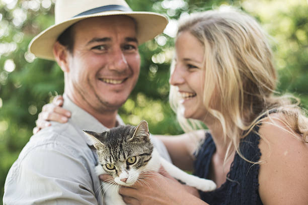 istock Happy couple with cute kitten 479046576