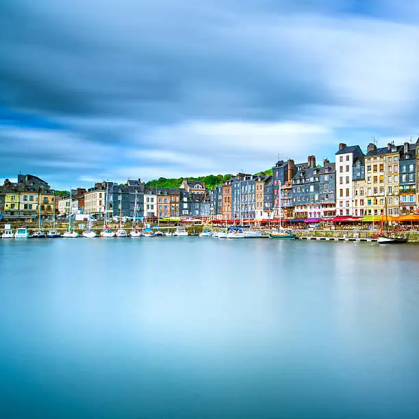 Honfleur famous village harbor skyline and water reflection. Normandy, France, Europe. Long exposure.