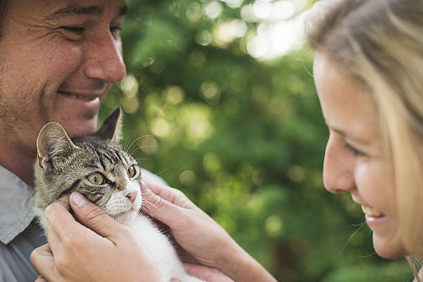 istock Happy couple with cute kitten 479047880