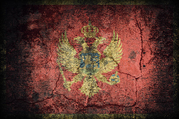 istock Montenegro flag pattern on dirty old concrete wall texture ,retr 479058234