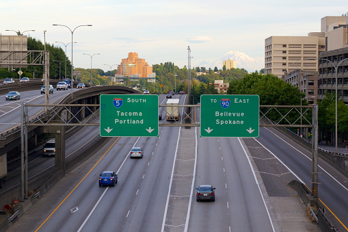 Seattle, WA, USA - June 23, 2015: View of the traffic on Interstate 5 (I5) looking south after rush hour. The directional signs for the cities of Portland, Spokane, Bellevue and Tacoma are displayed.
