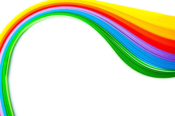 istock Rainbow colored quilling paper laid out in waves and shapes 479061372