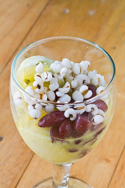 green tea and durian Ice cream in glass green tea and durian Ice cream in glass on wooden table red bean dessert stock pictures, royalty-free photos & images