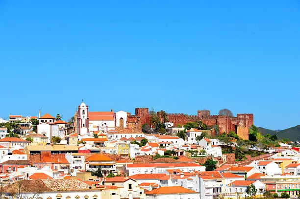 Silves, Faro, Portugal: skyline with the Cathedral and the Citadel - Algarve region