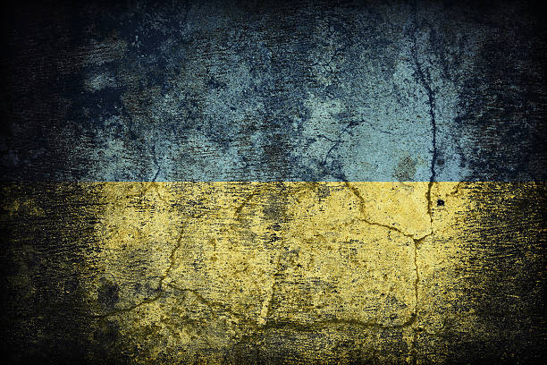 istock Ukraine flag pattern on dirty old concrete wall texture 479077548