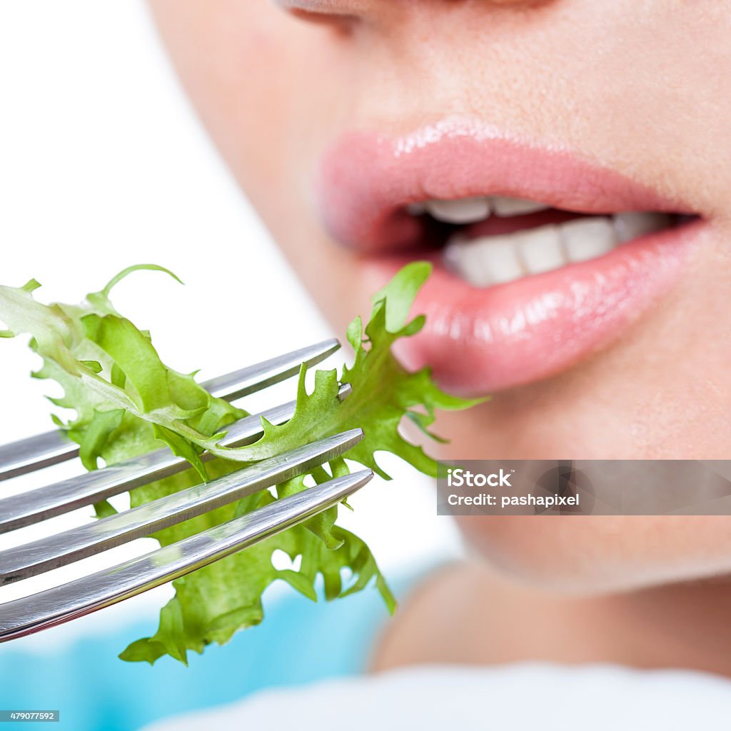 Happy vegetarian diet Woman eating salad, diet concept 2015 Stock Photo